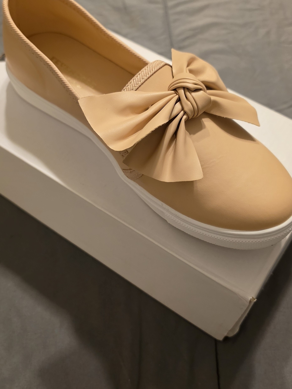 Fever Soles Women’s Slip-On Bow Sneakers in Beige